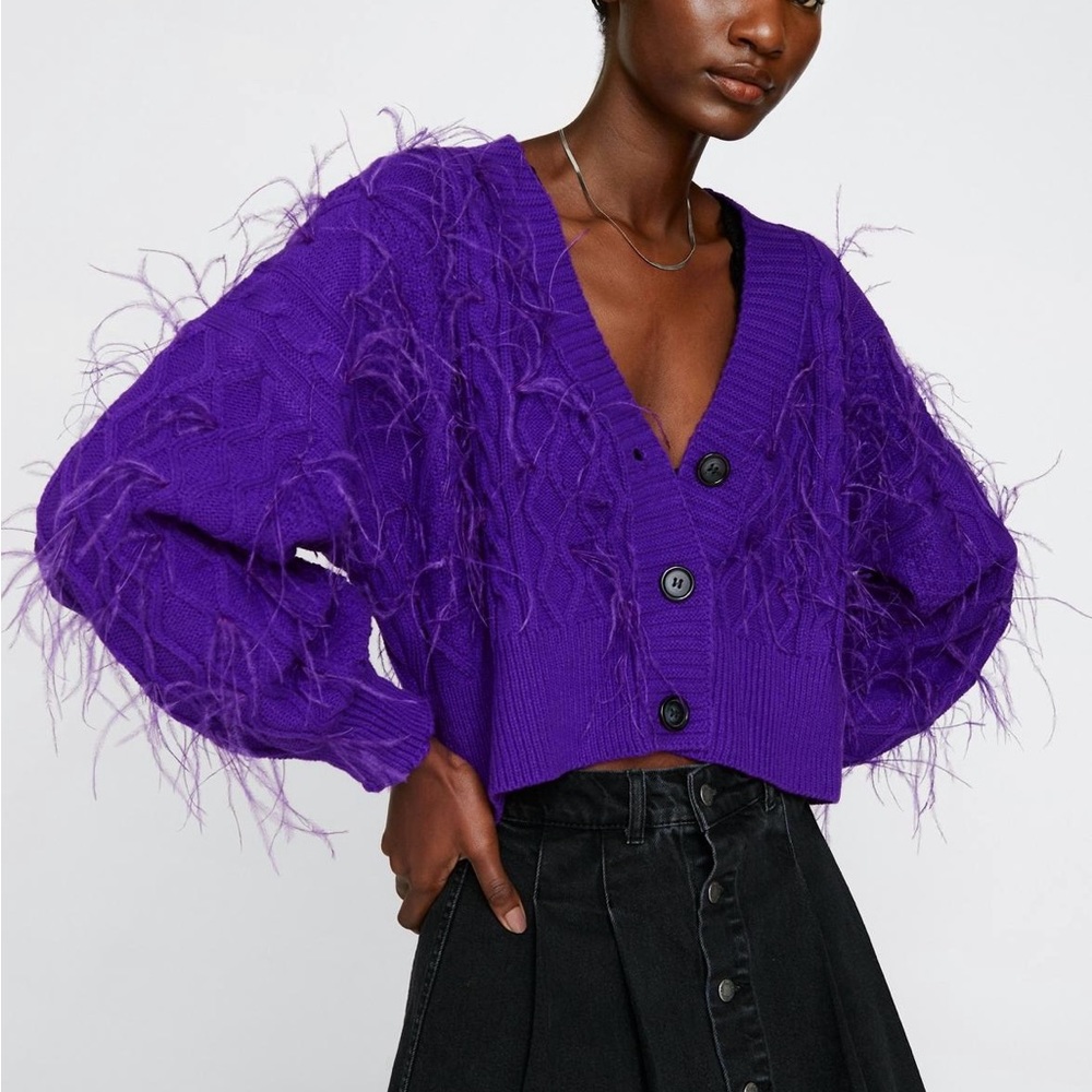 Sweater w/ feathers